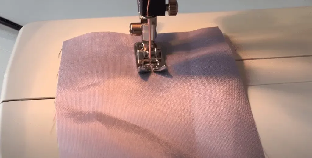 piece of fabric under the needle