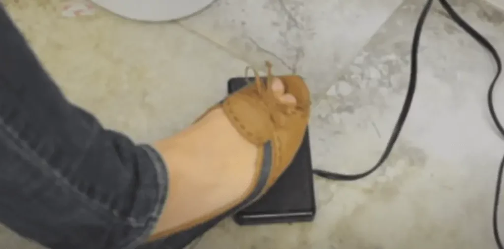 Press the foot pedal