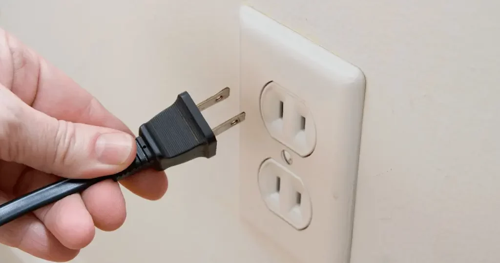 plug the sewing machine