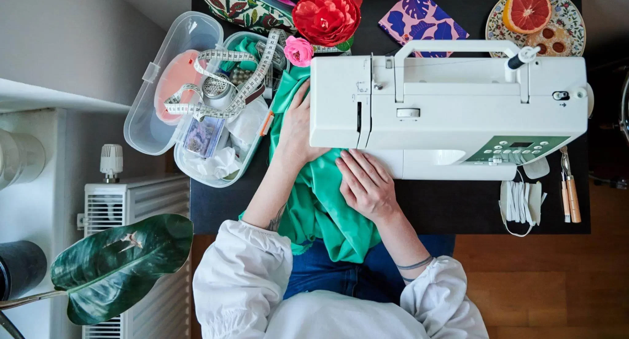 A woman is testing the best sewing machines with exceptional performance