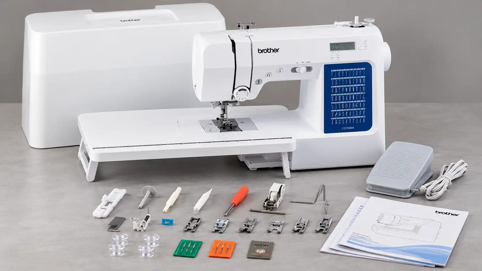 Presser feet and quilt guide included with the Brother CS7000X.